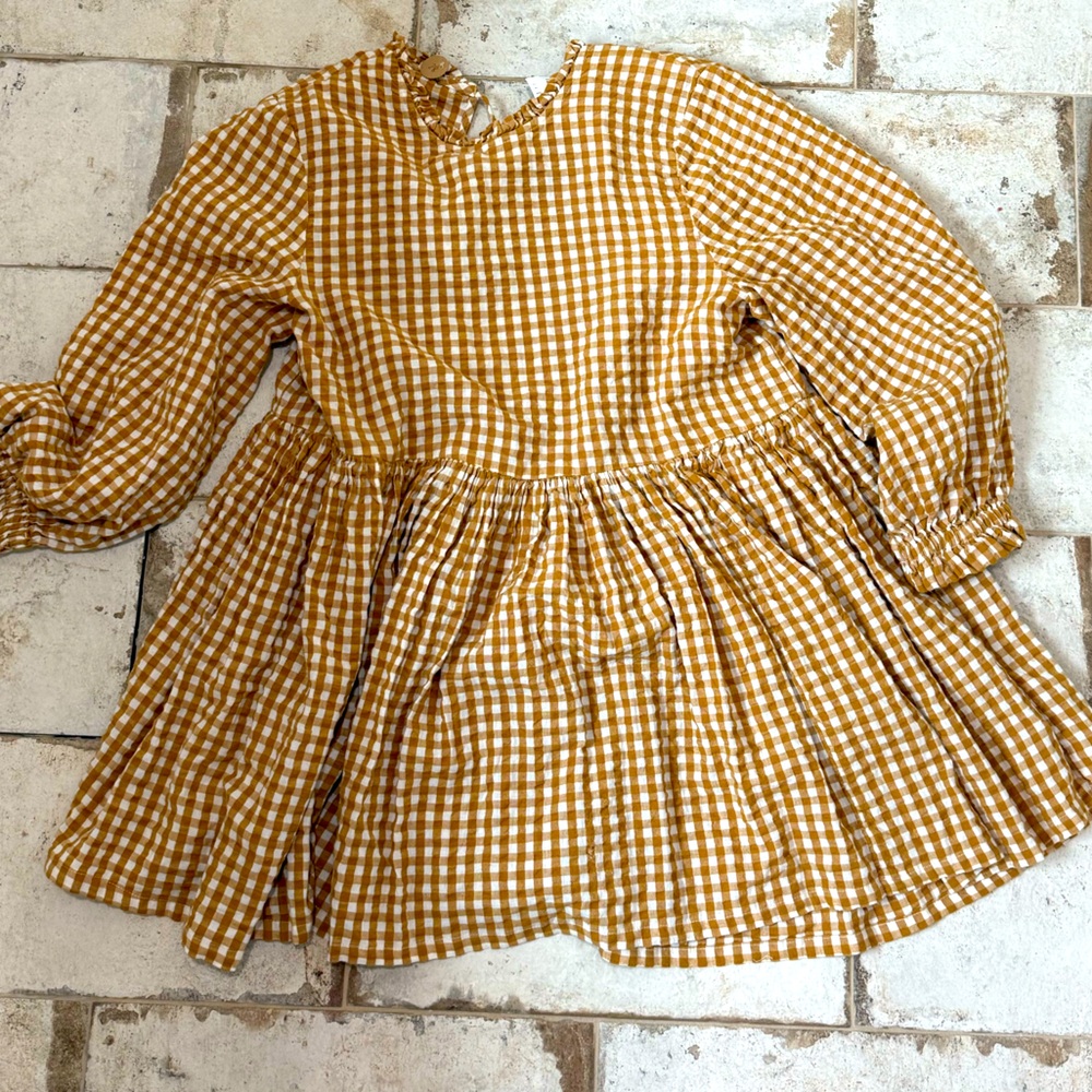 Add a plaid boho, loose vibe to any outfit.